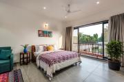 SaffronStays Mayfair Gardens - 4BR pet-friendly pool villa with patio, den, board games & modern interiors near jetty