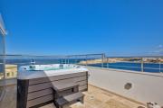 Valletta Luxury 4-Bedroom Duplex with Stunning Sea Views Private Terrace and Jacuzzi