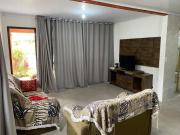 Casas de Veraneio em Torres com Terreno Compartilhado - Frontal
