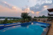 StayVistas Harvest Haven - Pool-View Villa with Deck & Machan near Sula