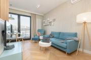 Bright Blue Apartment with Balcony, Parking and Air Conditioning in Warsaw by Renters