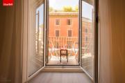 GuestHost - La finestra sui palazzi di Roma Apartment