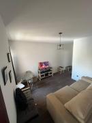 Quarto e sala São Mateus.