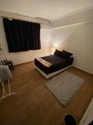 Cozy Room with AC near madinty in Shorouk City in an apartment