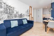 Old Town Aesthetic Deep Blue Apartments in Gdańsk by Renters