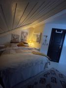 Casa Steinbekken, rom inkl morgenkaffe for par og kvinner med felles toalett