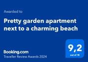 Pretty garden apartment next to a charming beach