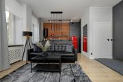 Exclusive Grey and Red Apartment in Warsaw Center by Renters