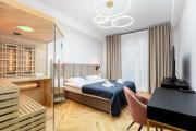 Luxury apartment with a sauna and bedroom with bath