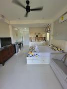 INATO SUITES Rm 1 1 queen bed and a pullout sofa bed