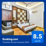 FabHotel Aman Residency Sharifpura