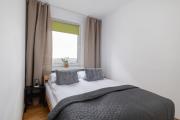 Close to Railway Station Apartment on the 7th Floor in Katowice by Noclegi Renters