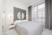 Luxurious Grey Apartment with Furnished Balcony and Parking by Renters