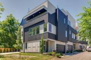 Stylish 4Bed Retreat with Rooftop, Garage, Peloton, Sleeps 12, Fire Table, Gourmet Kitchen, Cozy Living Space, Dedicated Parking, Near Distilleries, Marathon Village and Nightlife, Chic Skyline Views, 24 Hour Hospitality