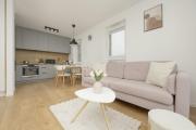 Bright Pastel Apartment with Desk for Remote Work, Balcony and Parking by Renters