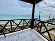 A private chale less than 20 feet from the ocean