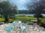 Cottage chaleureux face à létang