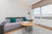 9th Floor Green and Grey Apartment in Gdańsk Brzeźno with Two Bedrooms and Parking by Renters
