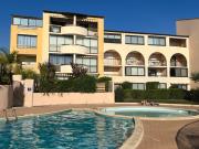 T2 rez de jardin plage piscines vue mer parking terrasse commerces