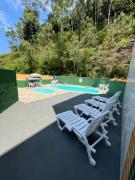 Kitnet com 2 piscinas a 4 quadras da Praia das Toninhas Ubatuba-SP