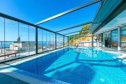 Seaside apartments with a swimming pool Brela, Makarska - 19834