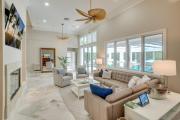 Golf Cart included! Waterfront home with Private Boat Dock Heated Pool and Game Room