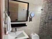 Costal condo with gym and Olympic pool