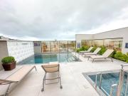 Apartamento novo,uma quadra praia de Bombas com piscina aquecida