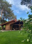 Charmantes Ferienhaus in Dbina mit Offenerem Kamin und Strand in der Nähe