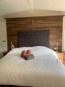 Luxury spacious house with two bathrooms at park with swimming pools, restaurant, bowling, massage & wellness