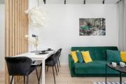 Modern White Studio with Furnished Balcony in Wrocław by Renters