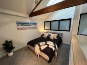 Apt with Aircon & Loft Bedroom Great Location
