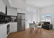 The Elm Apartments - The Orange Room