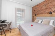 Elegant Apartment in Gdańsk with Sauna, Gym and Parking by Renters