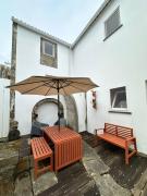 Apartamento acolhedor no centro da cidade, com pátio privado.