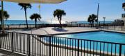 Sunbird Resort Ground Floor Gem with Ocean Views! Free Beach Chairs and Umbrella! by Dolce Vita Getaways PCB