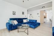 Dark Blue Two Bedroom Apartment in Wrocław with Parking and Air Conditioning by Renters