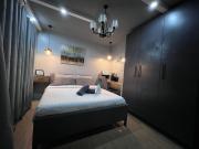 One Oasis Cozy condo beside Sm Ecoland