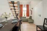 Cozy Apartment with Mezzanine Close to the Old Town in Wrocław by Renters