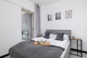 Charming Apartment with Parking in Katowice by Noclegi Renters