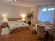 Apartamentai šalia baseino