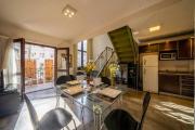 Enjoy natural light and garden view of this loft