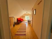 Majas Backe on a island with boat