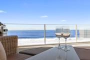 Beachside Luxury Penthouse with Breathtaking Views and Private Rooftop Terrace