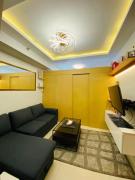 The Grass Residences cozy bedroom with balcony netflix and wifi