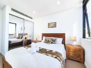 Relaxing 1BR w Pools & SPA, Gym in Olympic Park