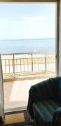 Apartment in front of the sea
