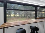 Bussie McBusFace, converted bus in Little River