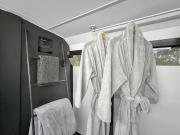 Bussie McBusFace, converted bus in Little River