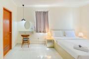 Restful and Cozy Studio Grand Palace Kemayoran Apartment By Travelio